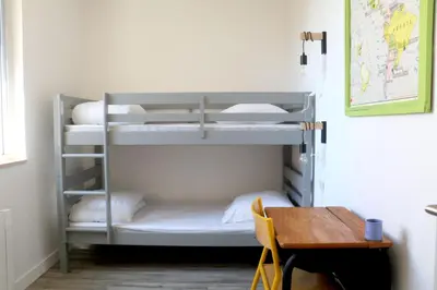 Un ou plusieurs lits dans un hébergement de l'établissement Le Logis d'Anaïs