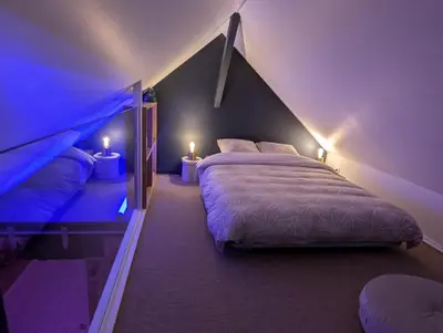 Un ou plusieurs lits dans un hébergement de l'établissement Le Loft - Résidence Chez Gally à Angers