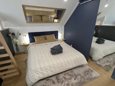 Un ou plusieurs lits dans un hébergement de l'établissement Le Loft - Résidence Chez Gally à Angers