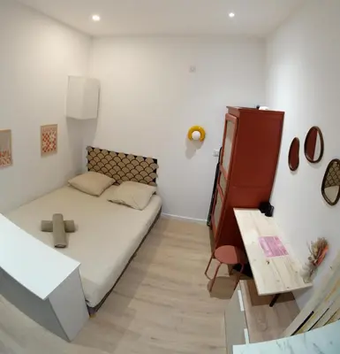Un ou plusieurs lits dans un hébergement de l'établissement charmant studio - coeur de ville - 2 personnes
