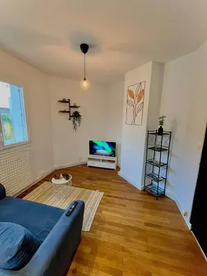 Télévision ou salle de divertissement dans l'établissement Le Moderne - Saint-Nazaire