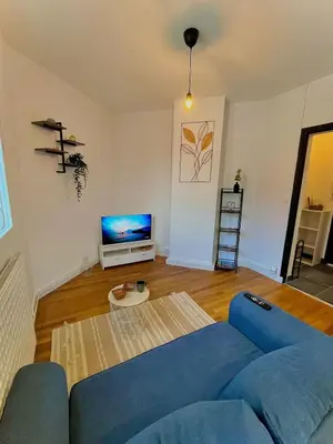 Télévision ou salle de divertissement dans l'établissement Le Moderne - Saint-Nazaire
