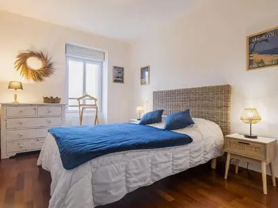 Un ou plusieurs lits dans un hébergement de l'établissement Duplex calme proche plage, parking sécurisé, petit animal accepté - FR-1-306-1322
