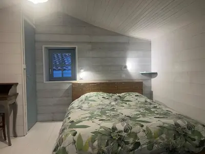 Un ou plusieurs lits dans un hébergement de l'établissement Villa Caprice des vents