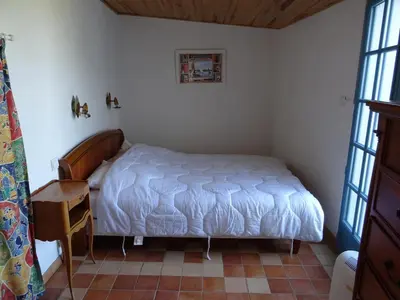 Un ou plusieurs lits dans un hébergement de l'établissement Villa Caprice des vents