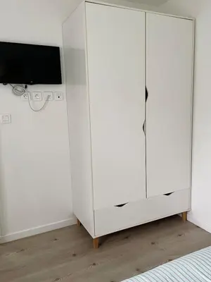Télévision ou salle de divertissement dans l'établissement T3 Escapade bord de mer