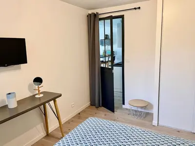 Télévision ou salle de divertissement dans l'établissement T3 Escapade bord de mer