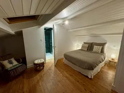 Un ou plusieurs lits dans un hébergement de l'établissement L'escapade océane, maison cosy, proche plage