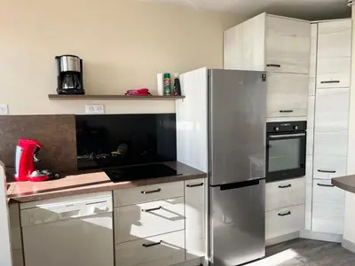 Cuisine ou kitchenette dans l'établissement Le Navire