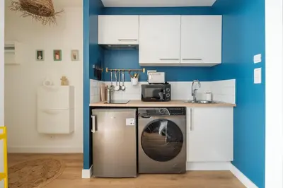 Cuisine ou kitchenette dans l'établissement Studio paisible au coeur de Nantes