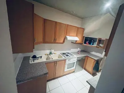 Cuisine ou kitchenette dans l'établissement chambre hôte