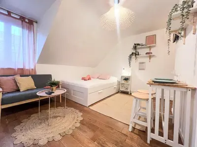 Coin salon dans l'établissement Studio cosy Centre-ville, proche gare et plage