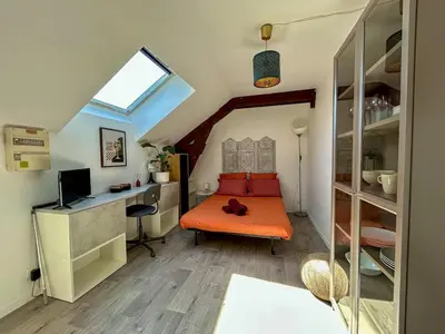Un ou plusieurs lits dans un hébergement de l'établissement Studio Bord de Loire - Couëron