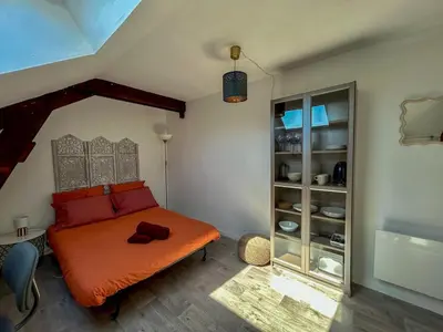 Un ou plusieurs lits dans un hébergement de l'établissement Studio Bord de Loire - Couëron