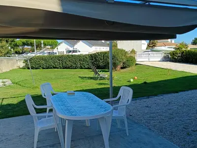 Jardin de l'établissement Maison de vacances à La Barre de Monts - Animaux admis, parking privatif - 6 pers. - FR-1-540-329