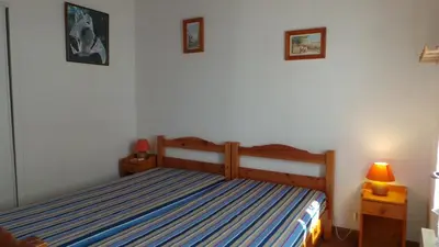 Un ou plusieurs lits dans un hébergement de l'établissement NO000-A10 Maison 3 pièces NO 6 couchages NOIRMOUTIER EN L'ILE