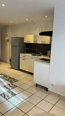 Cuisine ou kitchenette dans l'établissement Le Côté Plage - Saint-Nazaire