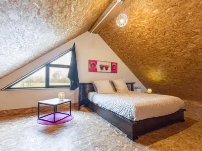 Un ou plusieurs lits dans un hébergement de l'établissement Gîte Rose en campagne avec SPA et Wi-Fi - FR-1-306-1328
