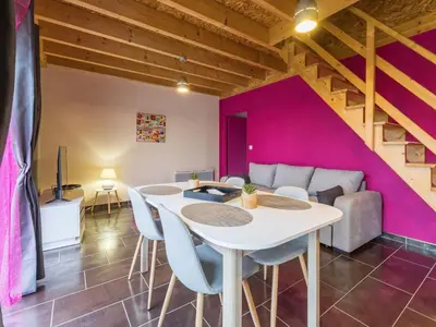 Coin salon dans l'établissement Gîte Rose en campagne avec SPA et Wi-Fi - FR-1-306-1328
