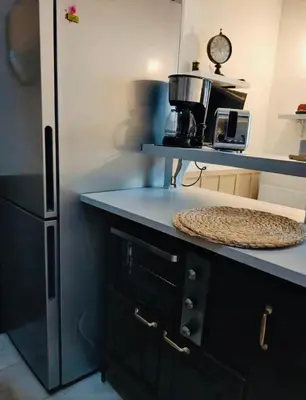 Cuisine ou kitchenette dans l'établissement Appartement duplex proche plage et forêt - loggia - parking