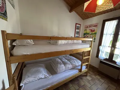 Un ou plusieurs lits dans un hébergement de l'établissement NO000-04V Mais 3 pièces- 4 couchages NOIRMOUTIER EN L'ILE