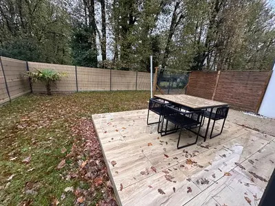 Jardin de l'établissement Maison 'Home Bien-Être' 30m2 avec terrasse et jardin