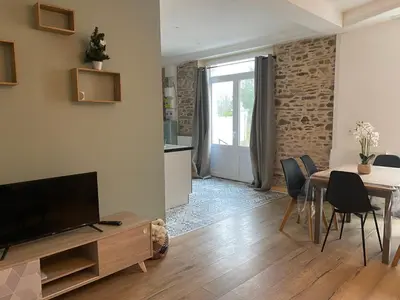 Télévision ou salle de divertissement dans l'établissement Appartement Le Pellerin 2ch et 2sdb