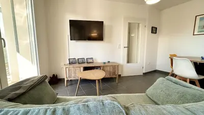 Télévision ou salle de divertissement dans l'établissement GU000-115 Appartement 2 pièces 2 couchages- la Guérinière