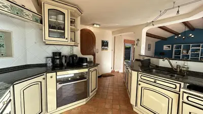 Cuisine ou kitchenette dans l'établissement GU000-18B - Mais 4 pièces - 7 couchages LA GUERINIERE