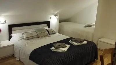 Un ou plusieurs lits dans un hébergement de l'établissement le CLOS des PALUDIERS chambre MOLENE