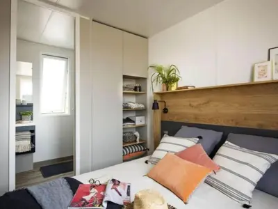Un ou plusieurs lits dans un hébergement de l'établissement Mobil-home spacieux avec terrasse - Saint-Jean-de-Monts - API-1-52-1453