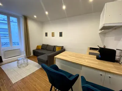 Coin salon dans l'établissement T2 au calme proche Talensac et Centre Ville