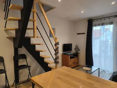 Télévision ou salle de divertissement dans l'établissement La pause Pornicaise - À deux pas du port