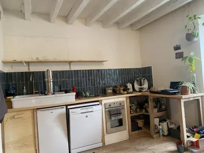 Cuisine ou kitchenette dans l'établissement Joli maison de bourg