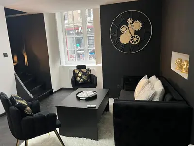 Coin salon dans l'établissement Le Lux Nantes Centre