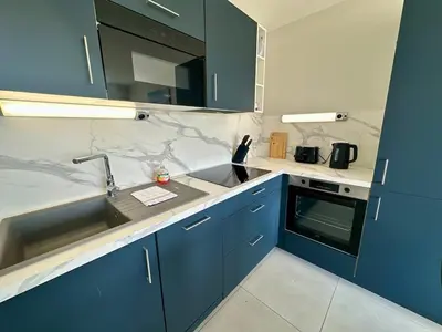 Cuisine ou kitchenette dans l'établissement T3 Rénové vue mer