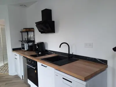 Cuisine ou kitchenette dans l'établissement Logement Mauléon - 4 personnes