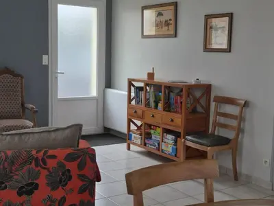 Coin salon dans l'établissement Maison accueillante à Saint-Hilaire-de-Chaléons avec jardin