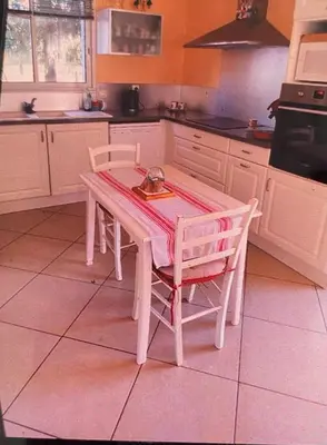 Cuisine ou kitchenette dans l'établissement Chez sylvie