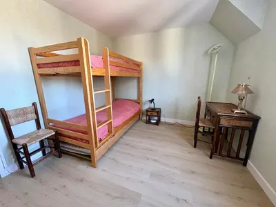 Un ou plusieurs lits dans un hébergement de l'établissement Bel appartement avec terrasse à deux pas de la mer