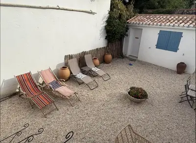 Terrasse ou espace extérieur de l'établissement L'escale les pieds dans l'eau
