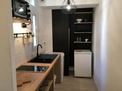 Cuisine ou kitchenette dans l'établissement Le Pratique - Studio - Près de la Gare