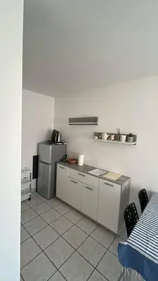 Cuisine ou kitchenette dans l'établissement Le Séjour Maritime - Saint-Nazaire