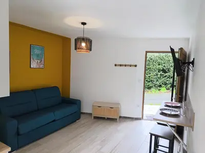 Coin salon dans l'établissement Le Nautile - petit déjeuner - 10mn du Parc
