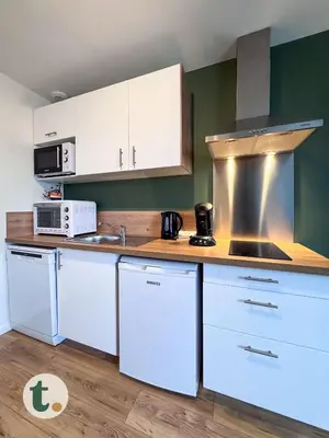 Cuisine ou kitchenette dans l'établissement Tranquiloue - Appart tendance 18min du Puy du Fou