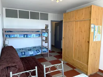 Un ou plusieurs lits dans un hébergement de l'établissement Studio en Rez-de-chaussée Vue Mer - Saint-Jean-de-Monts - FR-1-323-598