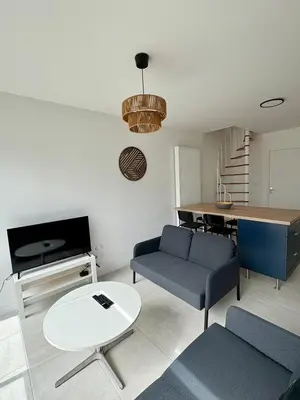 Coin salon dans l'établissement Maison de ville St Nazaire