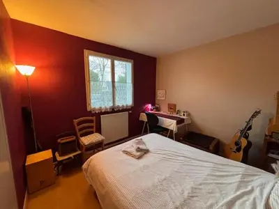 Un ou plusieurs lits dans un hébergement de l'établissement Chambre lit double