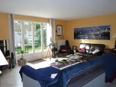 Coin salon dans l'établissement Chambre lit double