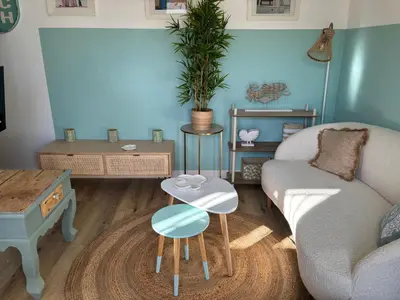 Coin salon dans l'établissement Le cosy beach
